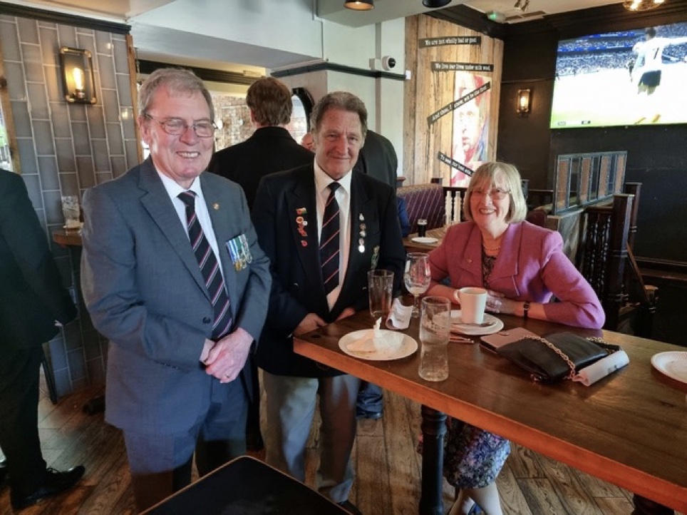 COMMANDER AND MRS PETER MACHIN RN AND MR JOHN COLES OF CARDIFF RNA